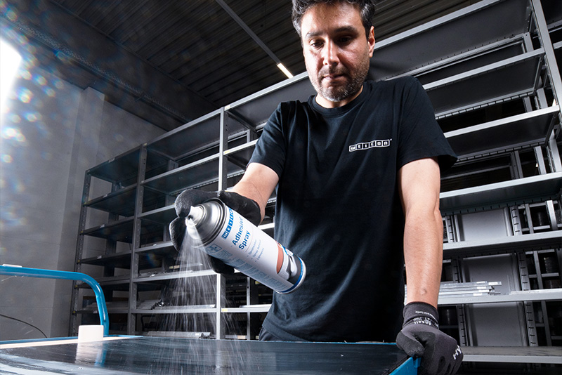 spray can, aerosol, gloves, black t-shirt, workshop